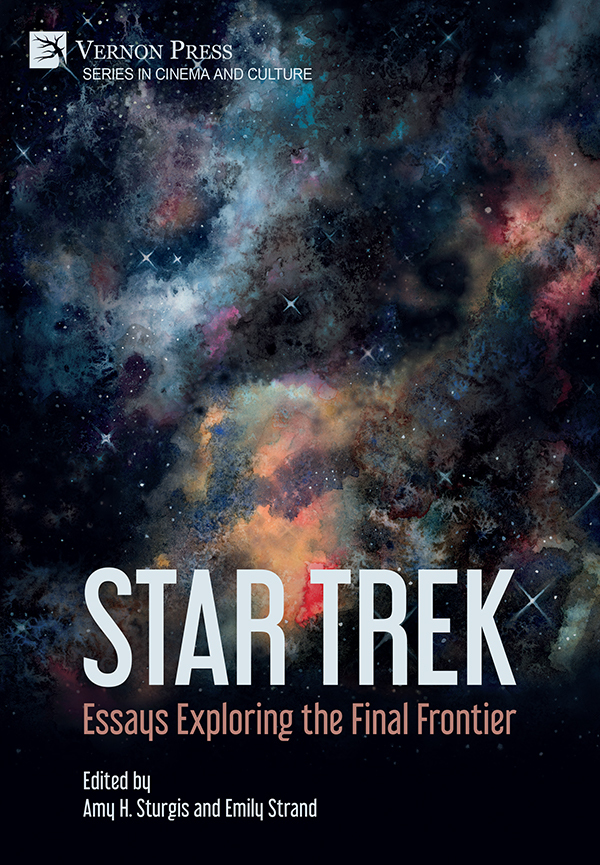 The title of this book is Star Trek; Essays Exploring the Final Frontier. The cover declares it to be published by Vernon Press and Edited by Amy H. Sturgis and Emily Strand. I tell you these things because no one ever is going to look at the words when they're staring at the incredible artwork by Emily Austin. She has used darkness and fluidity and somehow has created a breathtaking picture of a star creche, nebula gases, distant stars that makes me burst into tears at the beauty of creation. I mean. May I please live in the universe the Emily Austin paints?